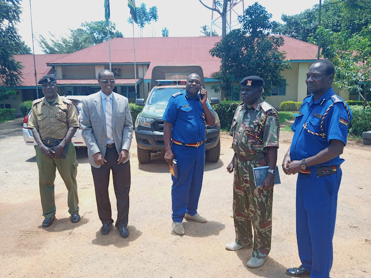 Bungoma county commmsioner Abdi Hassan with his security team