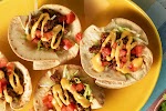 VELVEETA&#174; Tasty Baked Mini Taco Bowls was pinched from <a href="http://www.kraftrecipes.com/recipes/velveeta-tasty-baked-mini-taco-bowls-195353.aspx" target="_blank" rel="noopener">www.kraftrecipes.com.</a>