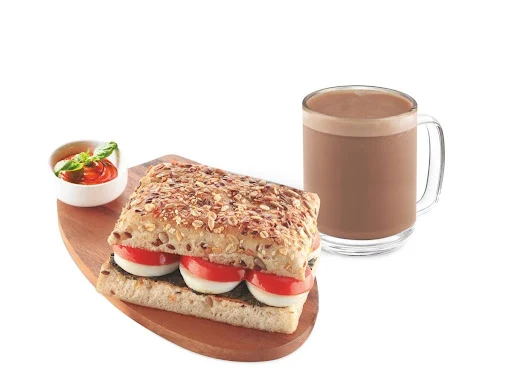 Tall Signature Hot Chocolate And Basil Tomato With Mozzarella Cheese Sandwich