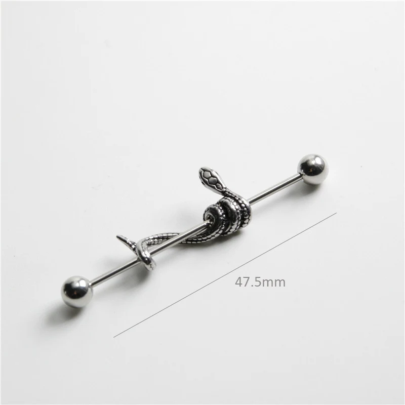 Boucles d'oreilles haltère serpent pour lancers longs. Design élégant et audacieux, parfaites pour un style unique et sophistiqué qui ne passera pas inaperçu.