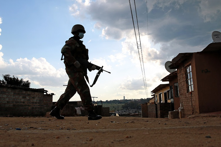 Soldiers put their boots on the ground in Alexandra on Friday as part of lockdown law enforcement. One case of Covid-19 has been confirmed in the over-crowded area.