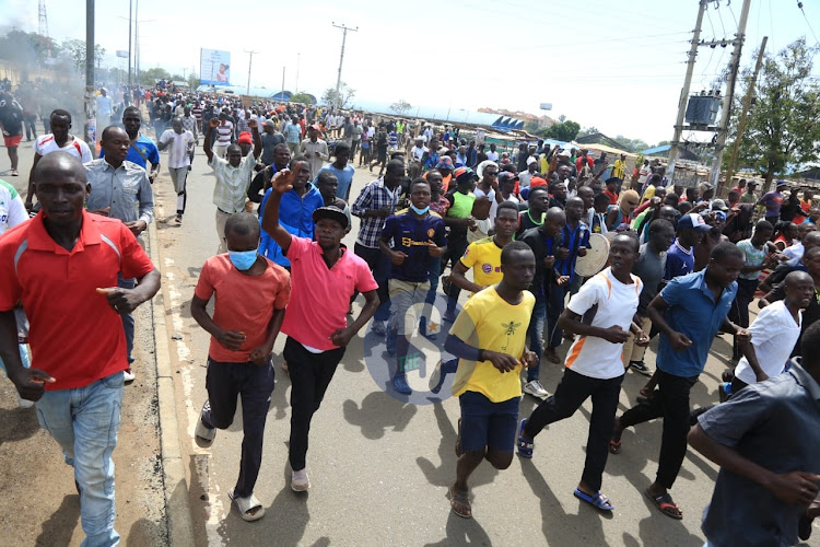 Protesters along along Kisumu-Kakamega road on March 30, 2023.