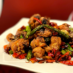 T11. 干香辣子鸡 Griddle Cooked Chicken with Diced Chilli Peppers