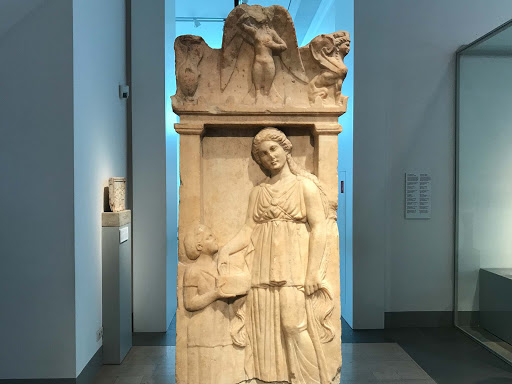   Funerary Stele of the Girl Silenis, Greek marble work, dates to 350 B.C. at the Altes Museum in Berlin.