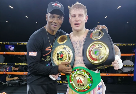 Newly crowned ABU junior middleweight Champ Roarke Knapp with trainer Sechaba Mabuya.