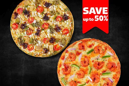 Buy One Get One - 1 Veg & 1 Non-Veg Medium Pizzas At 629