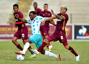 TS Galaxy forward Bernard Parker (in white and light blue) and Junior Mendieta of Stellenbosch FC during the DStv Premiership match at Danie Craven Stadium on May 20, 2023 in Stellenbosch, South Africa.