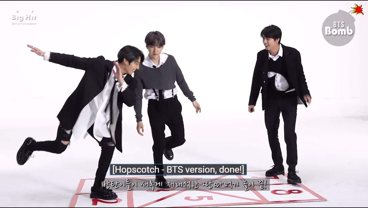 BTS Jin, Jungkook, and Suga palying Hopscotch