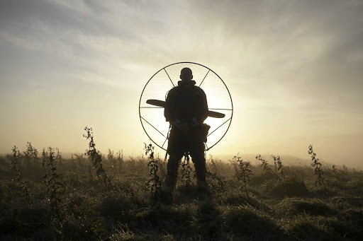 A paramotorist gets ready to fly in the Icarus Trophy in Nevada, US,