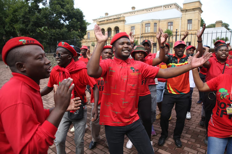 EFF protesters in front of the Bloemfontein magistrate's court ahead of the first court appearance of a man accused of attempting to murder a black teenager on Christmas Day at the Maselspoort holiday resort in the Free State.