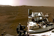 A portion of a panorama made up of individual images taken by the Navigation Cameras, or Navcams, aboard Nasa's Perseverance Mars rover shows the Martian landscape. 