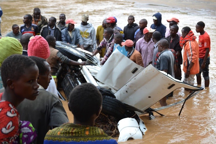 The vehicle whose four occupants drowned at the Mutindi river on Thursday morning as members tried to pull it out of the waters.