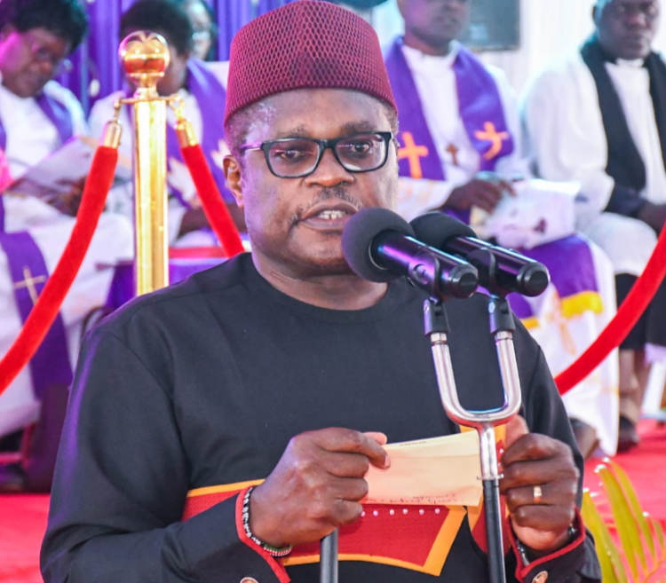 Bungoma governor Ken Lusaka addressing mourners at Mapera Primary in Kamukuywa on April 26, 2024 during the burial of his young brother Noah Lusaka, who perished in a tragic accident involving a cane tractor.