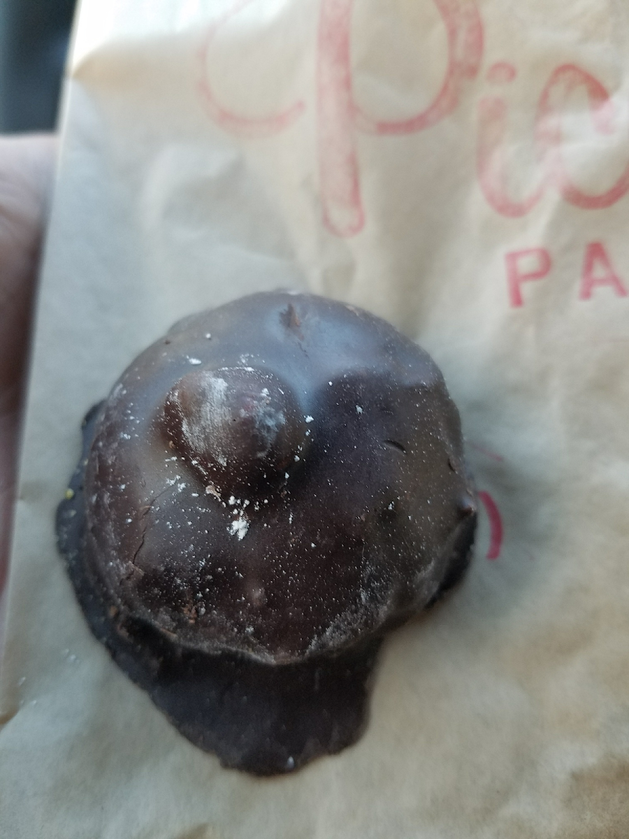 GF Baci (cocoa and hazelnut covered in chocolate). This was crazy good. It was  $1.75 but worth it. BTW, the white stuff is powdered sugar from my GF pistachio cannoli.