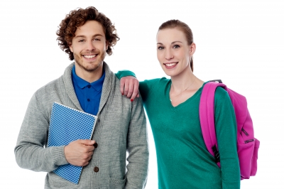 young man holding notebook and young woman carrying backpack