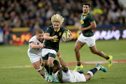 Faf de Klerk makes a break for the Springboks during the test match between South Africa and England at Ellis Park on June 09, 2018 in Johannesburg, South Africa. 