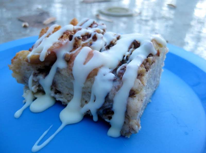 This Is The Bread Pudding I Made But With The White Chocolate Ganache Drizzled On It! Yummo!