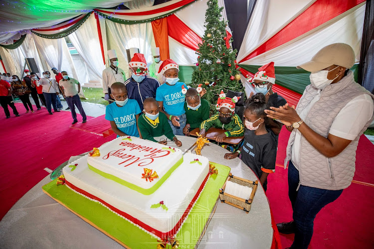 President Uhuru Kenyatta and First Lady Margaret Kenyatta hosted hundreds of children at State House, Nairobi for a Christmas party on December 19, 2021.