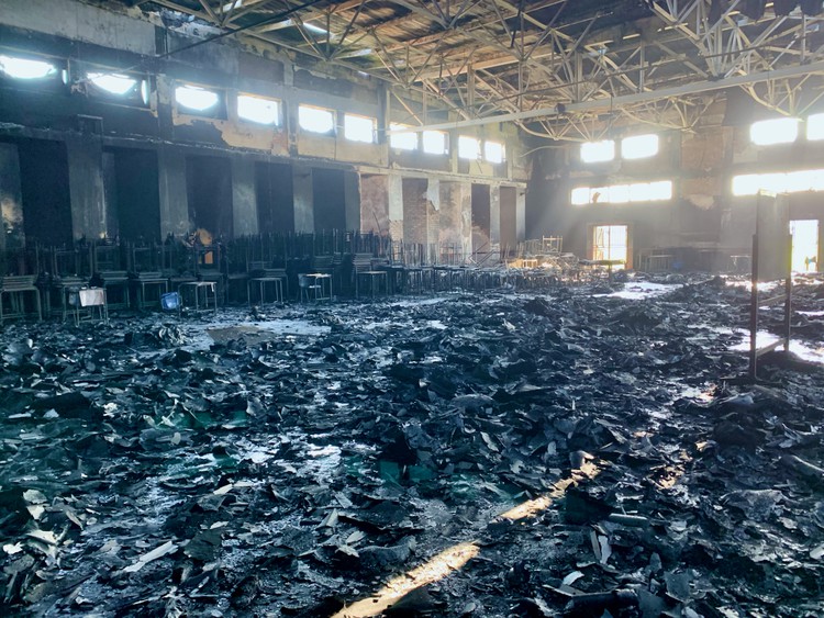 Residents seeking to occupy vacant land along Freedom Way in Joe Slovo, Cape Town, are accused of petrol bombing Sinenjongo High School on Wednesday.