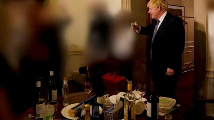 Mr Johnson pictured at a leaving party in November 2020