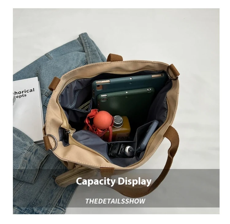 Niche Casual Fashion Nylon Canvas Tote Bag voor Dames. Lichtgewicht, ruim en perfect voor dagelijks gebruik, winkelen of reizen. Veelzijdig ontwerp.