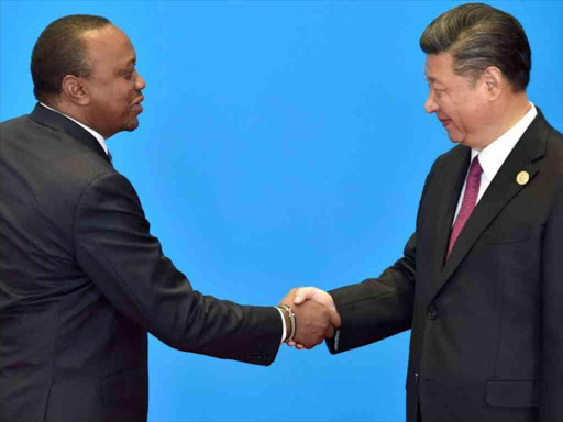 Chinese President Xi Jinping shakes hands with Kenya's President Uhuru Kenyatta during the welcome ceremony for the Belt and Road Forum, at the International Conference Center in Yanqi Lake, north of Beijing, China, May 15, 2017. /REUTERS