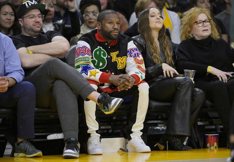 Boxer Floyd Mayweather Jnr attends an NBA game between the LA Lakers and Boston Celtics at Crypto.com Arena in Los Angeles.