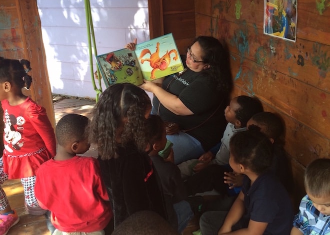 Reading to the children at House of Tiny Treasures in Houston