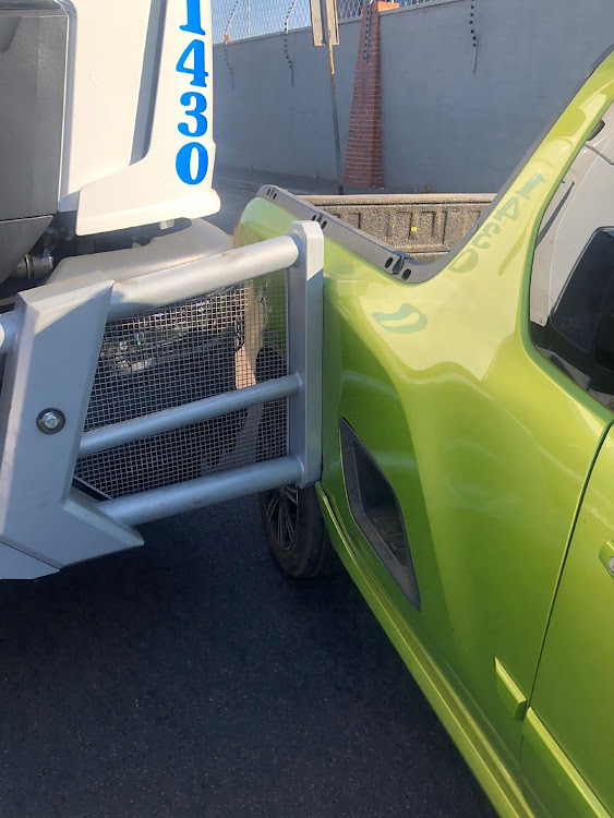 The bullbar of the truck scraped the side of the bakkie