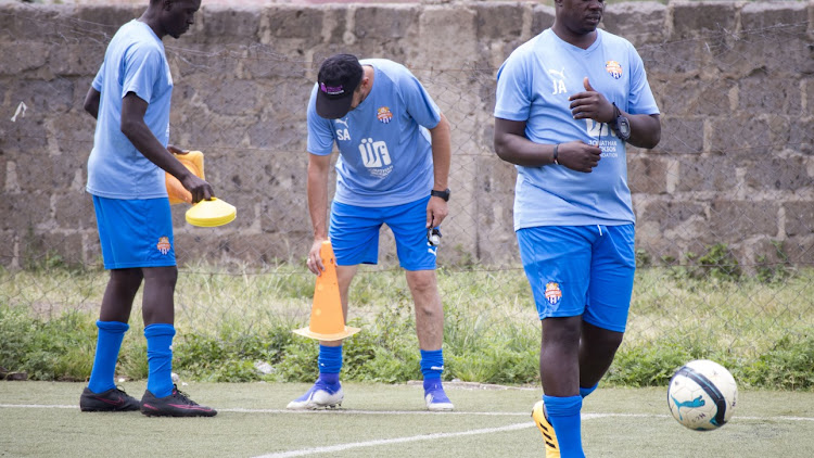 Outgoing City Stars coach Sanjin Alagic (C)has backed John Amboko (R) to succeed