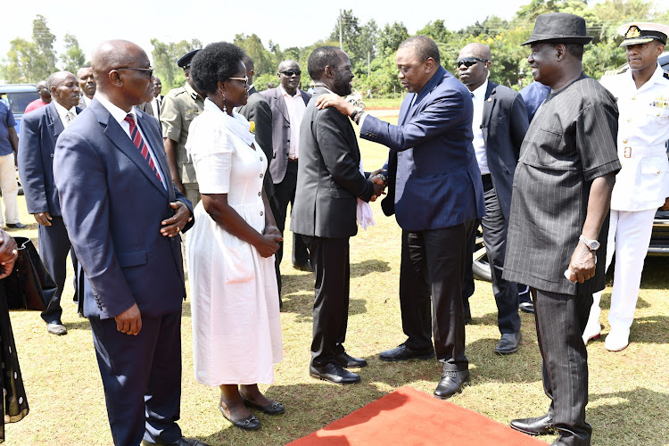 President Uhuru Kenyatta is welcomed by ODM leader Raila Odinga, Kisumu Governor Anyang' Nyong'o and wife Dorothy, and Kisii Governor James Ongwae in Seme subcounty, Kisumu.