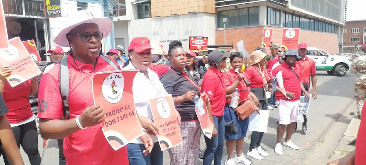 Popcru members protest at the Pietermaritzburg magistrate's court on Tuesday during the bail bid by a man accused of shooting Const Thabani Gwala during a road rage altercation.