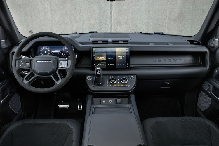 Defender V8 seats are trimmed in unique Ebony Windsor Leather with Miko Suedecloth and Robustec accents.