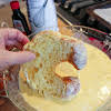 Thumbnail For Dipping Part Of The Croissant In The Egg Mixture.