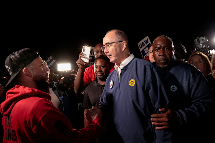 United Auto Workers union president Shawn Fain joins UAW members who are on a strike, on the picket line at the Ford Michigan Assembly Plant in Wayne, Michigan, US, on September 15 2023. Picture: REUTERS/REBECCA COOK