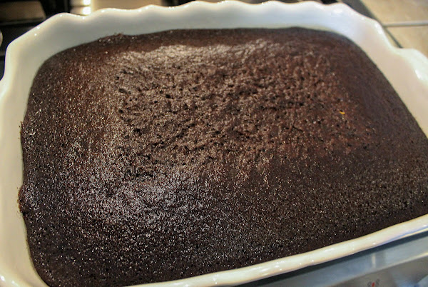 Baked chocolate cake cooling.