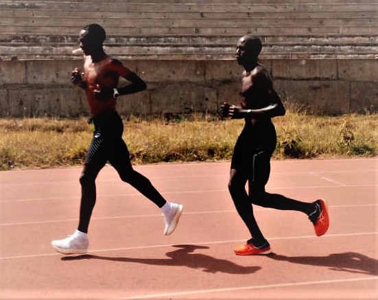 Elder brother Clement leads his brother Elkana during training at the Kipchoge Keino Stadium in Eldoret