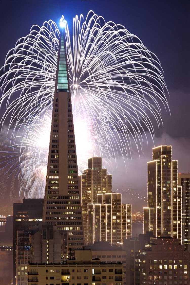 A fireworks display on New Year's Eve behind the Transamerica building in San Francisco.