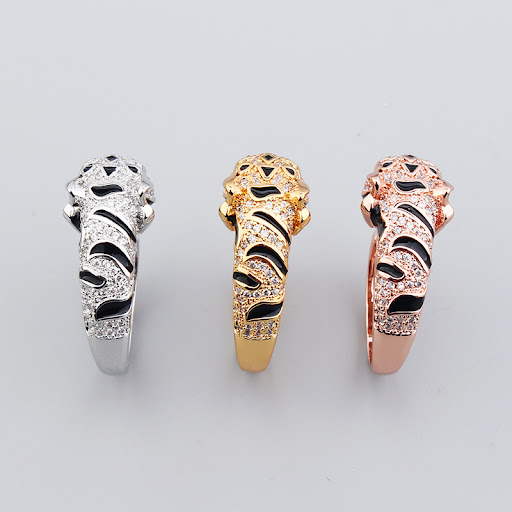Title 5, Temperament Leopard Head Couple Ring Asia. A un...
