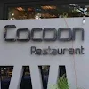 Cocoon- Dragonfly Hotel, Chakala, Andheri East, Mumbai logo