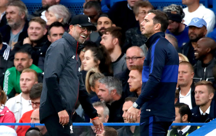 Liverpool's manager Jurgen Klopp (left) and Chelsea's manager Frank Lampard during a Premier League match at Stamford Bridge