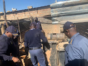 Police in Matholesville, Roodepoort, seize illegal mining equipment.