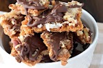 Chocolate Coconut Cracker Toffee Recipe was pinched from <a href="http://www.foodfanatic.com/recipes/chocolate-coconut-cracker-toffee-recipe/" target="_blank">www.foodfanatic.com.</a>