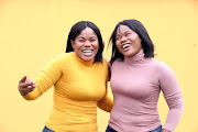 Twin sisters Olwethu and Owami Siko, who married the same man 11 years go.