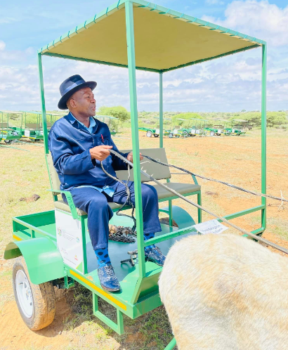 MEC for community safety and transport management, Sello Lehari test aboard one of the donkey carts that were donated to villagers outside Mahikeng.