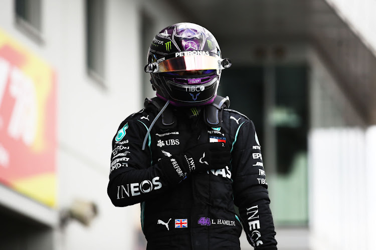 Race winner Lewis Hamilton of Great Britain and Mercedes GP celebrates in parc ferme during the F1 Eifel Grand Prix at the Nürburgring on October 11, 2020 in Nürburg, Germany.