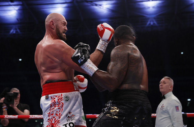 Tyson Fury knocks down Dillian Whyte to win their WBC World Heavyweight Title fight at Wembley Stadium, London on April 23, 2022