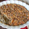 Thumbnail For Scooping The Praline Pecan Bread Pudding With Rum Sauce.