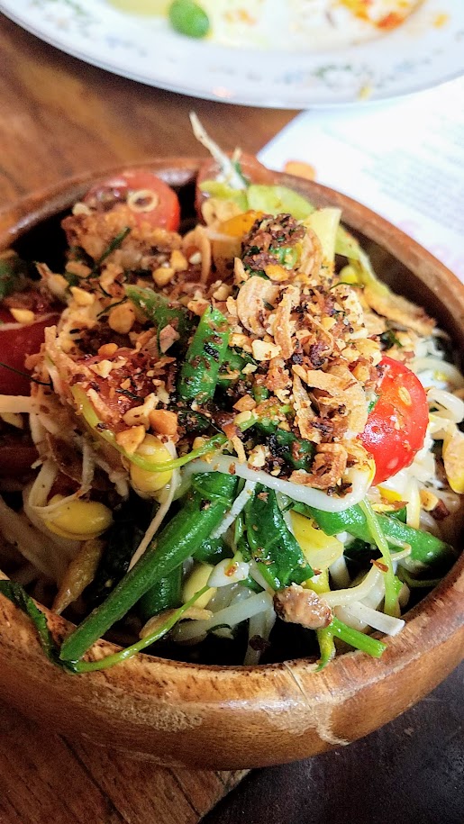 Gado Gado pop up presents food from Bali: green bean urap with spinach, cherry tomato, young coconut, fried sambal mbe, and surendang