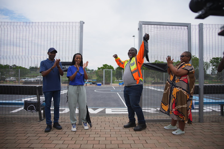 Coca-Cola Africa's Ramokone Ledwaba and Joburg's MMC of community development Lubabalo Magwentshu at the opening of the revamped multipurpose sports court at Orlando West Park in Soweto.